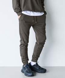 AXCXM（アクスシーム）の「mp15530-SOLID COMFORT - ZIP-SLIT TRACK PANTS トラックパンツ(AXM-BFA0005)（その他パンツ）」
