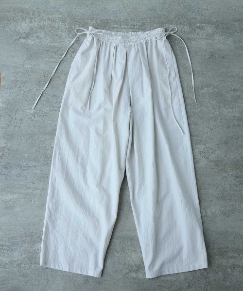 yuni(ユニ )の「Cotton uncut コールdrawstrings pants(その他パンツ・レディース・ネイビー/ホワイト・FREE)」の1枚目の写真