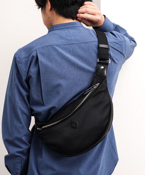 CLEDRAN(クレドラン)の「【CLEDRAN/クレドラン】別注ラウンドボディバッグ(ショルダーバッグ・メンズ・ブラック/ネイビー・FREE)」の2枚目の写真