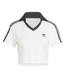 adidas（アディダス）の「adidas Originals V-NECK POLO（アディダスオリジナルス アディカラー フットボール ジャカード Vネック クロップポロシャツ）（シャツ/ブラウス）」