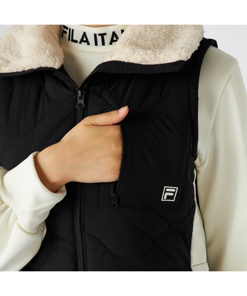 FILA GOLF(フィラゴルフ )の「FILA GOLF フィラゴルフ ゴルフウェア ワンポイント ロゴ ストレッチ 撥水 保温 中綿入り ボンディング ボア付き ワンピース(ワンピース・レディース・ベージュ/ブラック/オフホワイト・M/L/LL)」の20枚目の写真