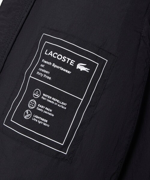 LACOSTE(ラコステ)の「軽量 撥水 ワッシャー加工 ライトウェイトパッカブルジャケット(ナイロンジャケット・メンズ・ライトグリーン/ブラック・52/48/46/50)」の14枚目の写真