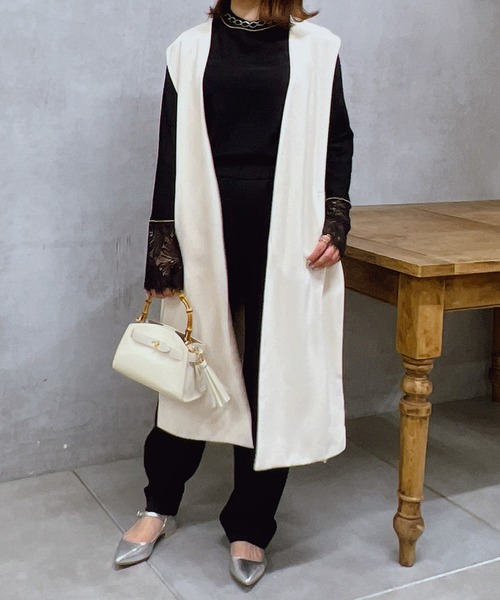 un dix cors（アンディコール）の「ダブルクロスロングジレ（ベスト