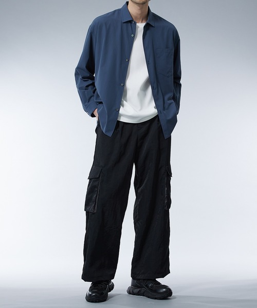 UNITED TOKYO(ユナイテッドトウキョウ)の「ヴァゼロナイロンカーゴパンツ | セットアップ着用可能(カーゴパンツ・メンズ・ブラック/ダークグレー・2/1)」の8枚目の写真