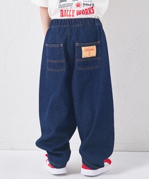 pairmanon（ペアマノン）の「ユニセックス ネームタグ付き カーブデニムパンツ（デニムパンツ）」