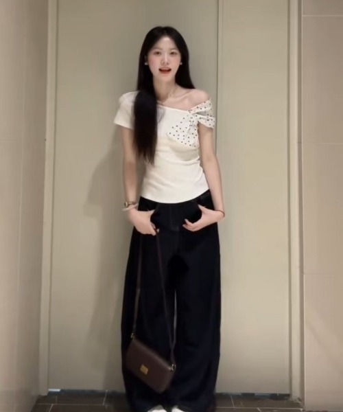 Ritzy（リッツィー）の「ドット柄　リボン付き アシンメトリートップス（Tシャツ/カットソー・レディース・ホワイト/ホワイト系その他・M/L/S）」の5枚目の写真