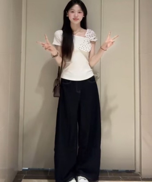 Ritzy（リッツィー）の「ドット柄　リボン付き アシンメトリートップス（Tシャツ/カットソー・レディース・ホワイト/ホワイト系その他・M/L/S）」の11枚目の写真