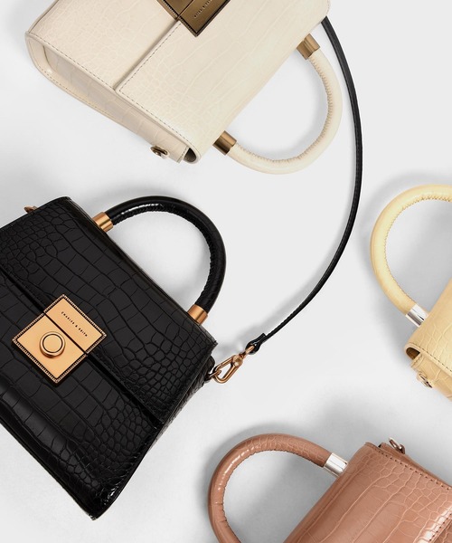 CHARLES & KEITH（チャールズ & キース）の「クロックエフェクト ストラクチャード スカルプチャーバッグ / Croc-Effect Structured Sculptural Bag（ハンドバッグ・レディース・ブラック/クリーム/イエロー/ベビーピンク・S）」の7枚目の写真