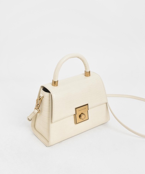 CHARLES & KEITH（チャールズ & キース）の「クロックエフェクト ストラクチャード スカルプチャーバッグ / Croc-Effect Structured Sculptural Bag（ハンドバッグ・レディース・ブラック/クリーム/イエロー/ベビーピンク・S）」の11枚目の写真