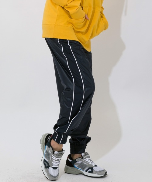 NEW BALANCE(ニューバランス)の「NB Athletics パイピング ウーブンパンツ(その他パンツ・レディース・ネイビー/ライトパープル・SMALL/MEDIUM/LARGE/X-LARGE)」の7枚目の写真