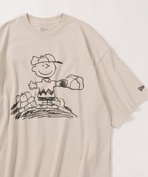 make a ray!（メイク ア レイ！）の「【NEW ERA/ニューエラ】PEANUTSコラボ  ワンポイントロゴ＆バックヴィンテージイラストデザイン 半袖プリントTシャツ/オーバーサイズドフィット（Tシャツ/カットソー・メンズ）」