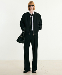 TNGT（ティーエヌジーティー）の「Flared Fit Slit Pants (Black) TNPA5F106BK（スラックス）」