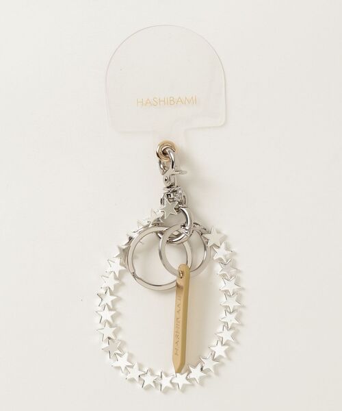 HASHIBAMI(ハシバミ)の「HASHIBAMI HEMATITE STAR STRAP(スマホグッズ・レディース・ゴールド/シルバー・ONE SIZE)」の1枚目の写真