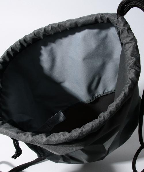 NIKE（ナイキ）の「NIKE / ヘリテージ ジムサック（バックパック/リュック・レディース・グレー・ONE SIZE）」の6枚目の写真