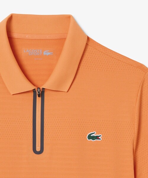 LACOSTE(ラコステ)の「UVカット ウルトラドライ コートジャカードジップポロシャツ(ポロシャツ・メンズ・オレンジ/ネイビー・4/5/3)」の10枚目の写真