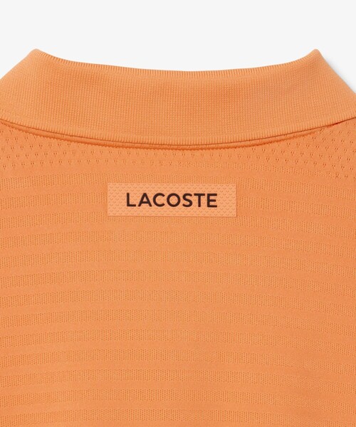 LACOSTE(ラコステ)の「UVカット ウルトラドライ コートジャカードジップポロシャツ(ポロシャツ・メンズ・オレンジ/ネイビー・4/5/3)」の12枚目の写真