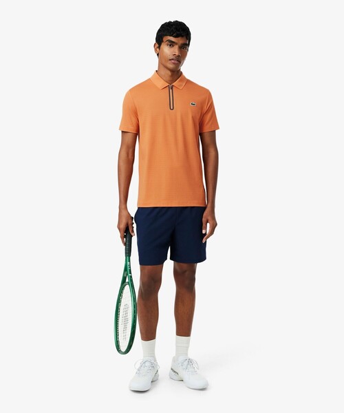 LACOSTE(ラコステ)の「UVカット ウルトラドライ コートジャカードジップポロシャツ(ポロシャツ・メンズ・オレンジ/ネイビー・4/5/3)」の14枚目の写真