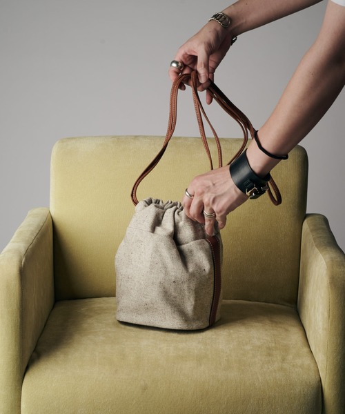 SLOW（スロウ）の「【SLOW】cruiser-draw string shoulder bag（ショルダーバッグ・メンズ・ブラック/ベージュ・FREE）」の2枚目の写真