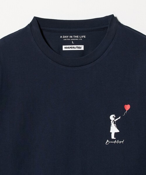 A DAY IN THE LIFE UNITED ARROWS(アデイインザライフユナイテッドアローズ)の「<BRANDALISED × A DAY IN THE LIFE >バンクシー アートTシャツ GIRL(Tシャツ/カットソー・メンズ・ネイビー/ホワイト・L/M)」の17枚目の写真