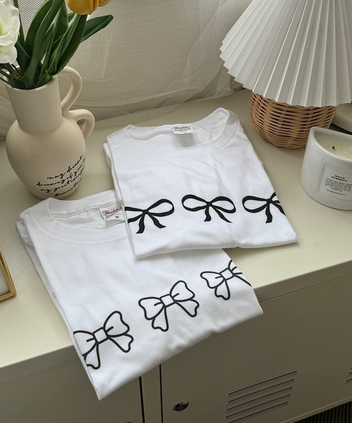 cuorequal(クオレコール)の「リボンプリント半袖Tシャツ(Tシャツ/カットソー・レディース・ホワイト系その他/ホワイト・LARGE/MEDIUM)」の1枚目の写真