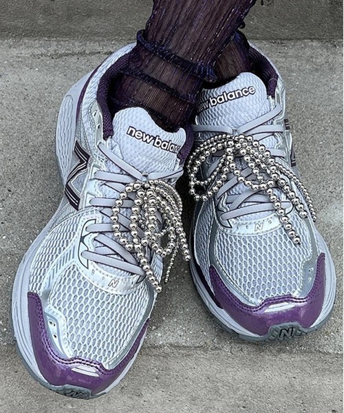 LA VORAGINE（ラ ヴォラジネ）の「パールリボンチャーム（チャーム・レディース・シルバー/ホワイト/ブラック・FREE）」の3枚目の写真