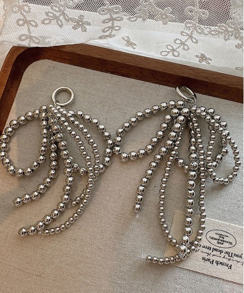 LA VORAGINE（ラ ヴォラジネ）の「パールリボンチャーム（チャーム・レディース・シルバー/ホワイト/ブラック・FREE）」の14枚目の写真