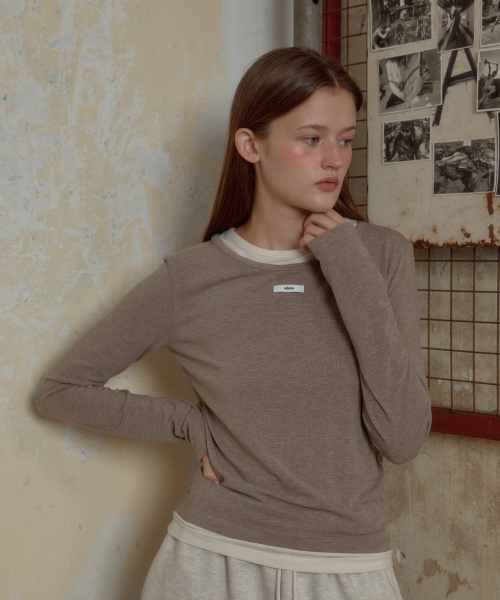 LETERIE(レテリー)の「DOUBLE LAYERED LONGSLEEVE TEE_BEIGE(Tシャツ/カットソー・レディース・ベージュ・FREE)」の1枚目の写真