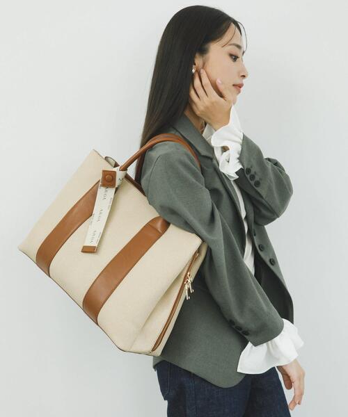 RODE SKO(ロデスコ)の「『別注』AJUGA.×RODE SKO ロゴリボン付ビッグトート(トートバッグ・レディース・オフホワイト/アイボリー・ONE)」の7枚目の写真