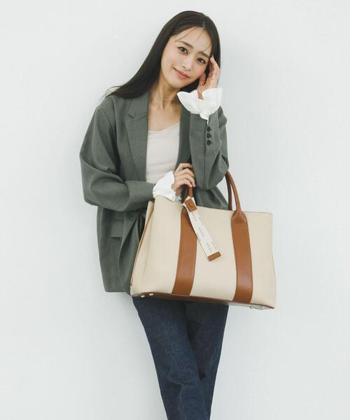 RODE SKO(ロデスコ)の「『別注』AJUGA.×RODE SKO ロゴリボン付ビッグトート(トートバッグ・レディース・オフホワイト/アイボリー・ONE)」の6枚目の写真