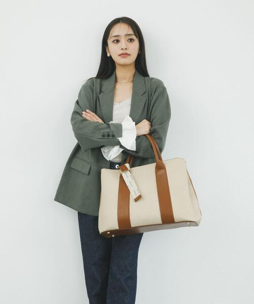RODE SKO(ロデスコ)の「『別注』AJUGA.×RODE SKO ロゴリボン付ビッグトート(トートバッグ・レディース・オフホワイト/アイボリー・ONE)」の5枚目の写真