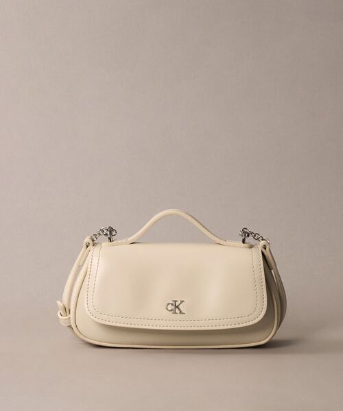 Calvin Klein(カルバン・クライン)の「クロスボディバッグ - トップハンドルクロスボディバッグ(ショルダーバッグ・レディース・ブラック/アイボリー/ピンク系その他・FREE)」の1枚目の写真