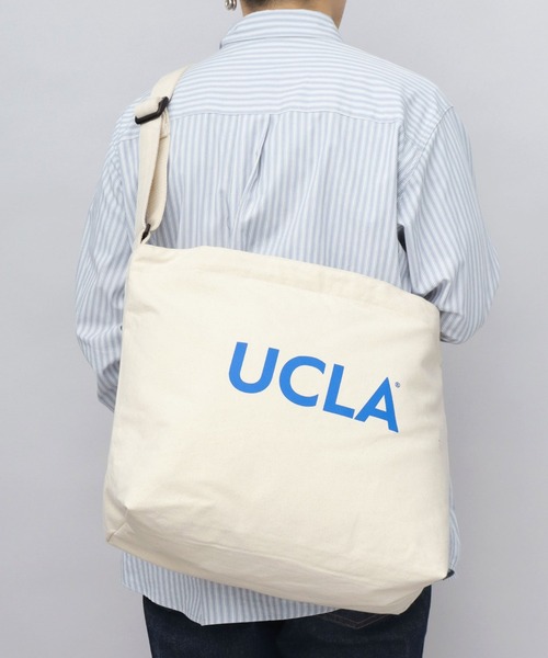 UCLA(ユーシーエルエー)の「UCLA キャンバスショルダーバッグ A4収納対応 ジョー 刺繍(ショルダーバッグ・メンズ・ブラック/オフホワイト・FREE)」の1枚目の写真