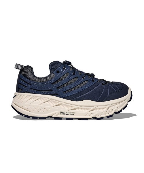 HOKA(ホカ)の「HOKA ELITE TERRAIN SYSTEM STINSON EVO OG(ホカ エリートテレインシステム スティンソン エボ OG)(スニーカー・メンズ・ネイビー系/ベージュ系・23cm/23.5cm/24cm/24.5cm/25cm/26cm/28cm/28.5cm/29cm/25.5cm/26.5cm/27cm/27.5cm)」の1枚目の写真