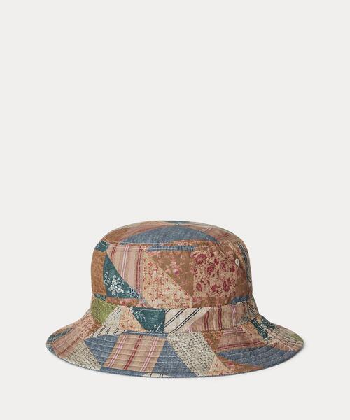 POLO RALPH LAUREN CHILDRENSWEAR(ポロ ラルフ ローレン チルドレンズウェア)の「パッチワーク リバーシブル コットン バケット ハット(ハット・キッズ・マルチ・ONE)」の1枚目の写真