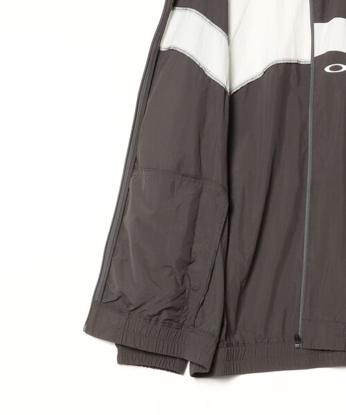 OAKLEY(オークリー)の「オークリー ENHANCE ACLIFE WIND JACKET 2.0/ウィンドジャケット/UPF50+/撥水/防風/スポーツ・トレーニング/OAKLEY(その他アウター・メンズ・グレー/ブルー系その他・S/XL/M/L)」の3枚目の写真