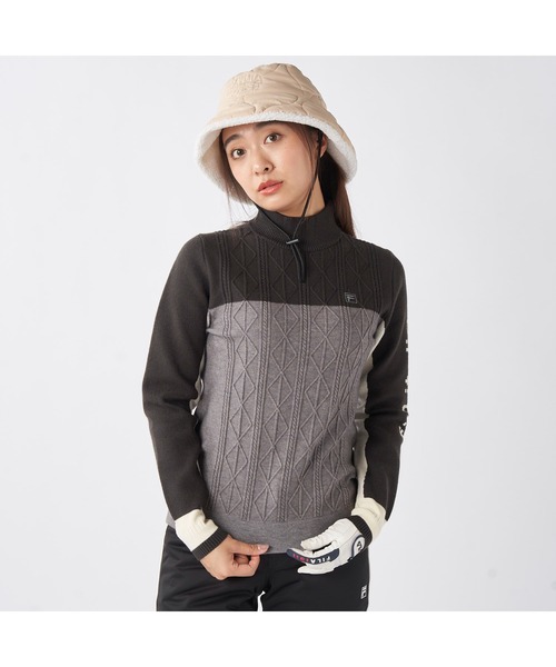 FILA GOLF(フィラゴルフ )の「FILA GOLF フィラゴルフ ゴルフウェア ワンポイント ロゴ 配色切替 ハイネック モックネックセーター(ニット/セーター・レディース・ネイビー/イエロー/ブラック・M/L/LL)」の2枚目の写真