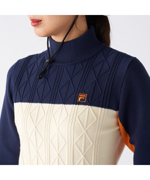 FILA GOLF(フィラゴルフ )の「FILA GOLF フィラゴルフ ゴルフウェア ワンポイント ロゴ 配色切替 ハイネック モックネックセーター(ニット/セーター・レディース・ネイビー/イエロー/ブラック・M/L/LL)」の19枚目の写真