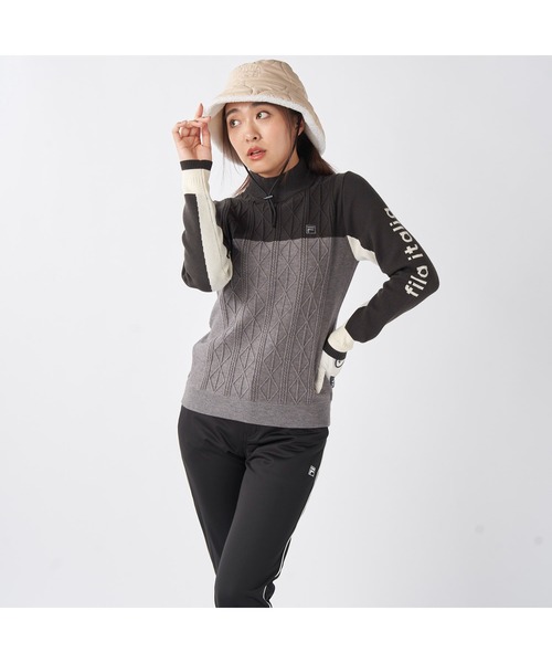 FILA GOLF(フィラゴルフ )の「FILA GOLF フィラゴルフ ゴルフウェア ワンポイント ロゴ 配色切替 ハイネック モックネックセーター(ニット/セーター・レディース・ネイビー/イエロー/ブラック・M/L/LL)」の4枚目の写真