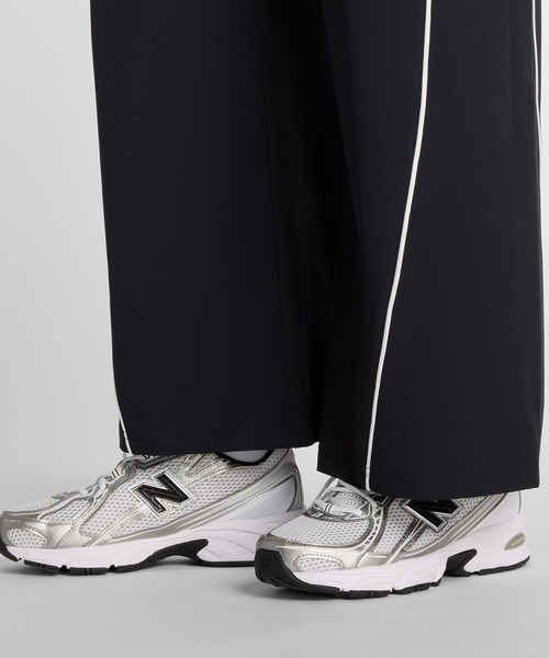 NEW BALANCE(ニューバランス)の「ウーブンワイドパンツ(スウェットパンツ・レディース・ライトグレー/ブラック・SMALL/MEDIUM/LARGE/X-LARGE)」の12枚目の写真