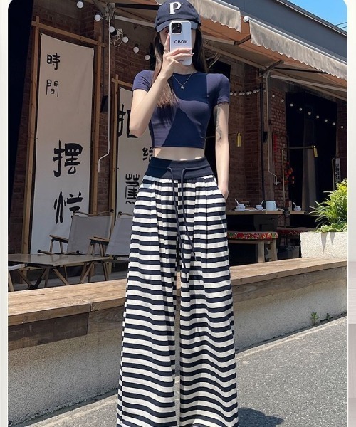 Ritzy(リッツィー)の「ボーダー柄 ワイドパンツ(その他パンツ・レディース・ブラック/ネイビー・M/L/S)」の8枚目の写真