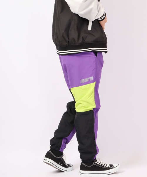 LONSDALE(ロンズデール)の「LONSDALE ナイロンワッシャー ジョガーパンツ(その他パンツ・メンズ・ブラック/グリーン/パープル・LL/L/M)」の1枚目の写真