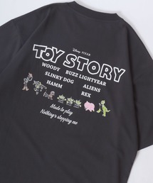 Disney（ディズニー）の「Disney PIXAR/ディズニー ピクサー トイ・ストーリー イラスト バックプリント 半袖Tシャツ レディース メンズ（Tシャツ/カットソー・メンズ）」