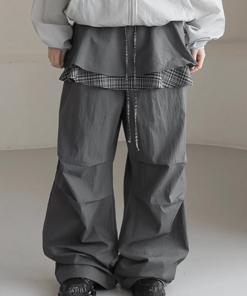.KOM(ドットコム)の「A'GEM/9 × .kom 『.KOM/ドットケーオーエム』 レイヤードパンツ(その他パンツ・レディース・グレー/ブラック・FREE)」の9枚目の写真