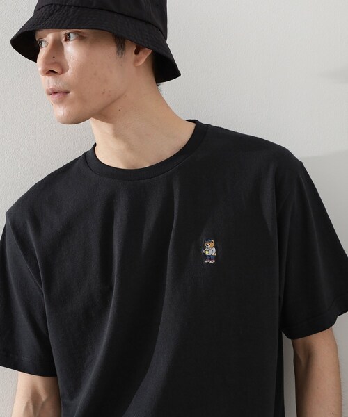 THE SHOP TK (ザ ショップ ティーケー )の「ワンポイントベアーロゴ半袖Tシャツ【洗濯機OK】(Tシャツ/カットソー・メンズ・オフホワイト/ブラック・04/03/02)」の1枚目の写真