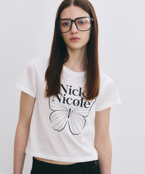 NICK&NICOLE(ニックアンドニコール)の「BUTTERFLY SIGNATURE CROP TOP_IVORY BLACK(Tシャツ/カットソー・レディース・その他・FREE)」の3枚目の写真