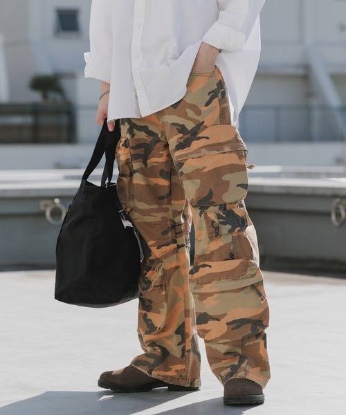 Theater code(シアターコード)の「Duck Pattern Distressed Ripstop Wide Cargo Pants / カモ柄 ダメージ加工リップストップ ワイドカーゴパンツ 2026年春夏(カーゴパンツ・メンズ・ブラウン・M/L)」の1枚目の写真