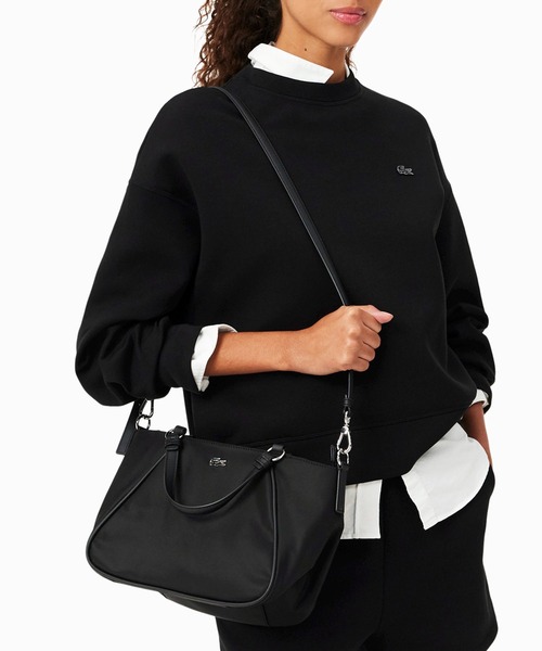 LACOSTE(ラコステ)の「デイ イン L トップハンドルバッグ(ハンドバッグ・レディース・ベージュ/ブラック・FREE)」の1枚目の写真