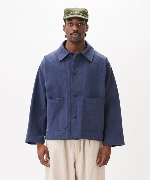 WISM(ウィズム)の「Estudio Niksen / エストゥディオ・ニクセン Plain Chore Jacket(カバーオール・メンズ・ブルー・1)」の1枚目の写真