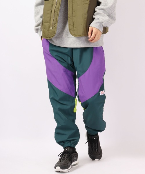 LONSDALE(ロンズデール)の「LONSDALE ナイロンワッシャー 配色切替 スノーパンツ(その他パンツ・メンズ・グリーン/パープル/ブラック・M/L/LL)」の1枚目の写真