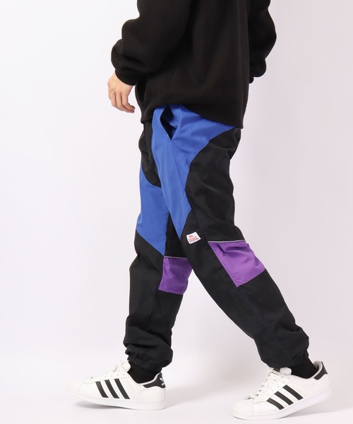 LONSDALE(ロンズデール)の「LONSDALE ナイロンワッシャー 配色切替 スノーパンツ(その他パンツ・メンズ・グリーン/パープル/ブラック・M/L/LL)」の2枚目の写真